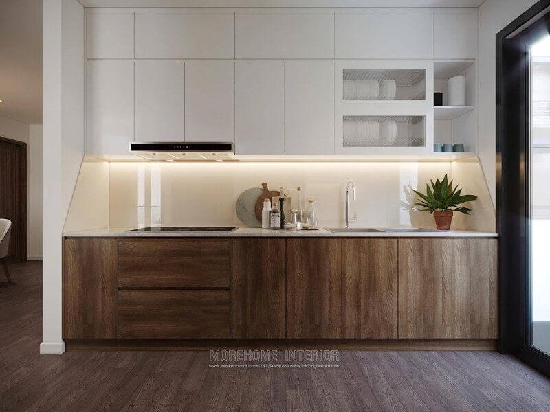 Tủ bếp dưới được làm từ gỗ công nghiệp, màu nâu trầm sang trọng, ngăn tủ cỡ lớn tạo sự thuận tiện cho việc cất, chứa đồ đạc của người nội trợ. Thiết kế nội thất phòng bếp