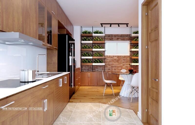 Thiết kế phòng bếp chung cư đẹp với hệ tủ bếp gỗ tự nhiên cao cấp mang đến không gian nấu ăn lí tưởng cho các chi em nội trợ.